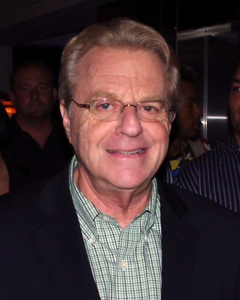 Jerry Springer cracking a smile